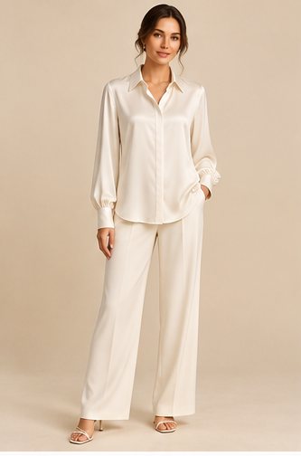 Solène — Fluid ivory silk with a clean collar.